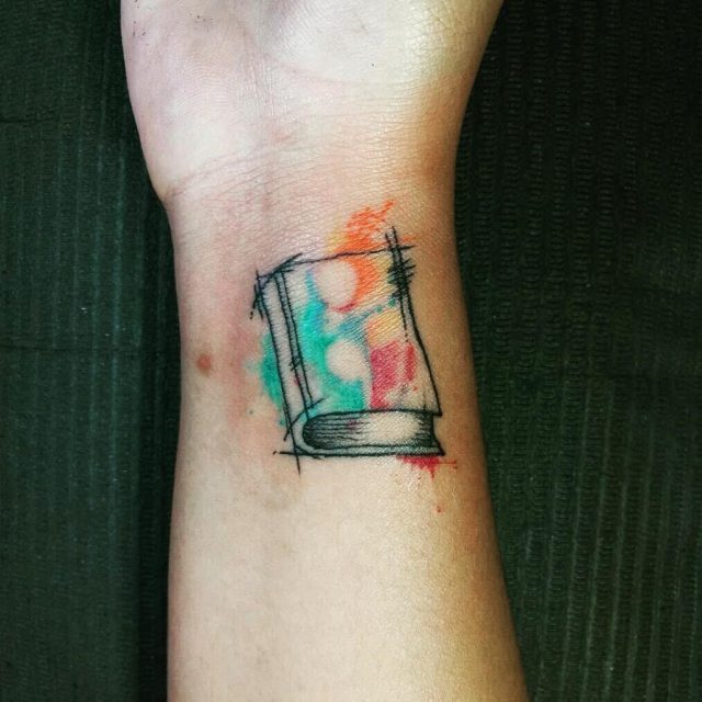 Book watercolor negative space semicolon tattoo