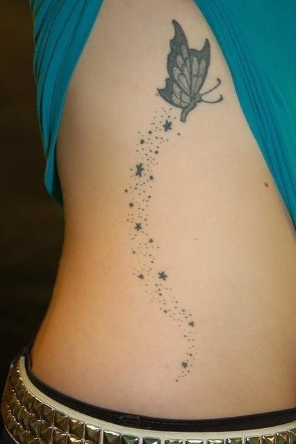 Butterfly tattoo on rib side