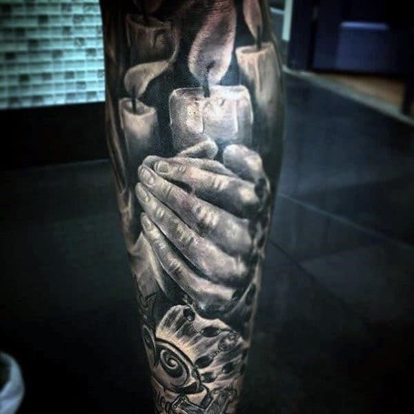 Candles and prayers religious tattoo guys forearm