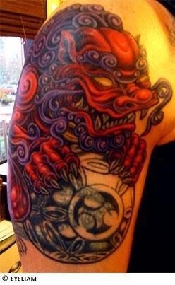 Chinese lion tattoo