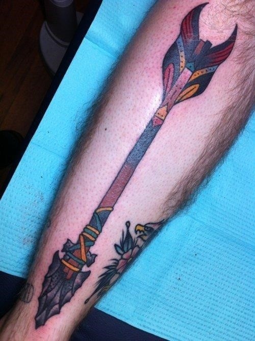 Color ink arrow tattoo