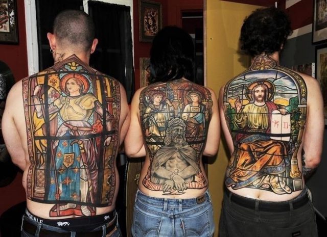 Colored back body christian tattoos for men