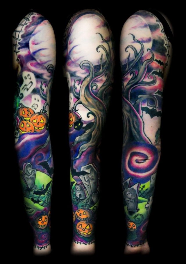 Colored halloween tattoo on full sleeve