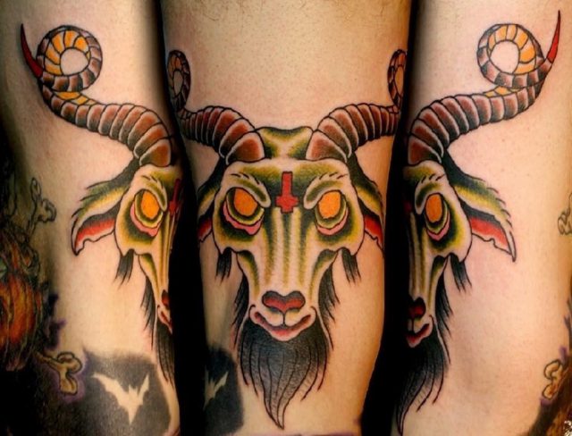 Colorful aries head tattoo