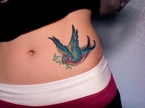 Colorful dove hip tattoo