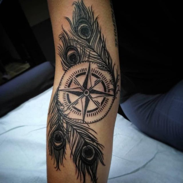 Compass peacock feather tattoo