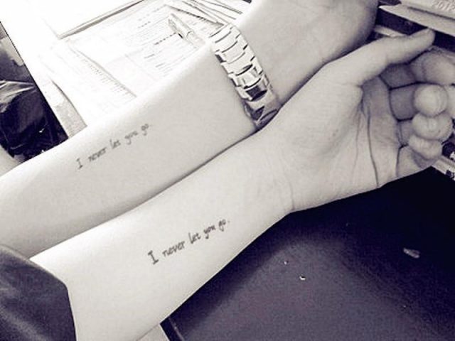 Couple have matching tattoo design