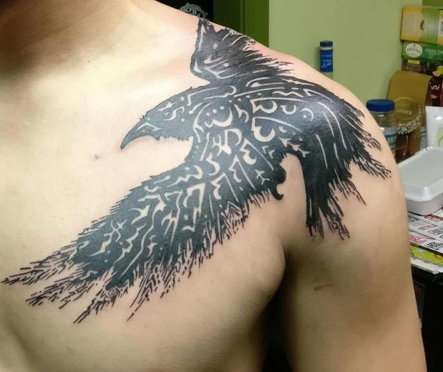 Crow raven shoulder tattoo