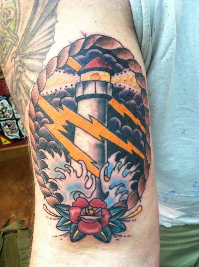 Custom traditional lighthouse storm waves clouds rope rose arm tattoo david meek ashtabula ohio tucson arizona tattoos tough