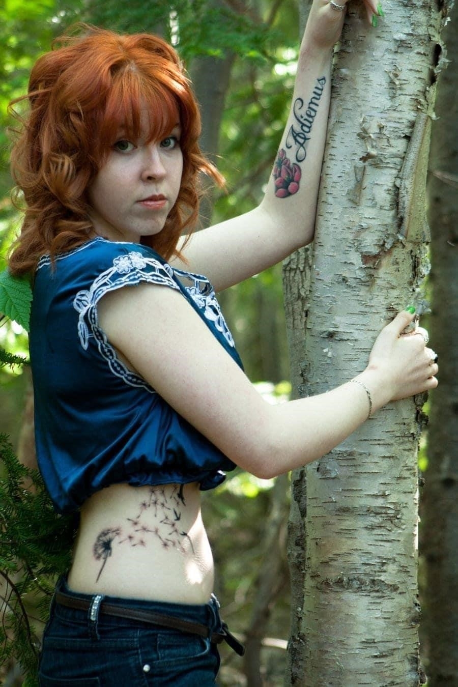 Colorful Flowers Tattoo On Girl Side Rib