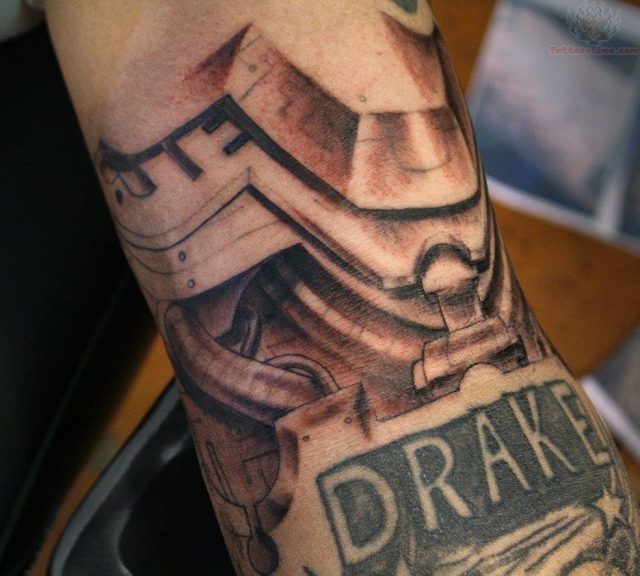 Drake mechanical tattoo