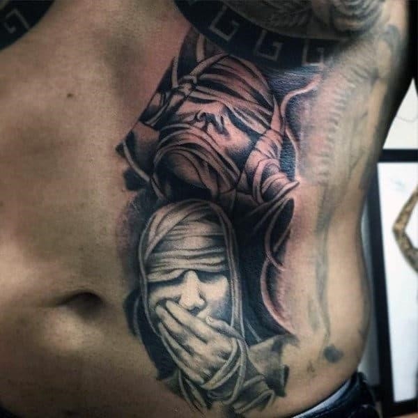Egyptian mummy wrap stomach tattoo designs for men