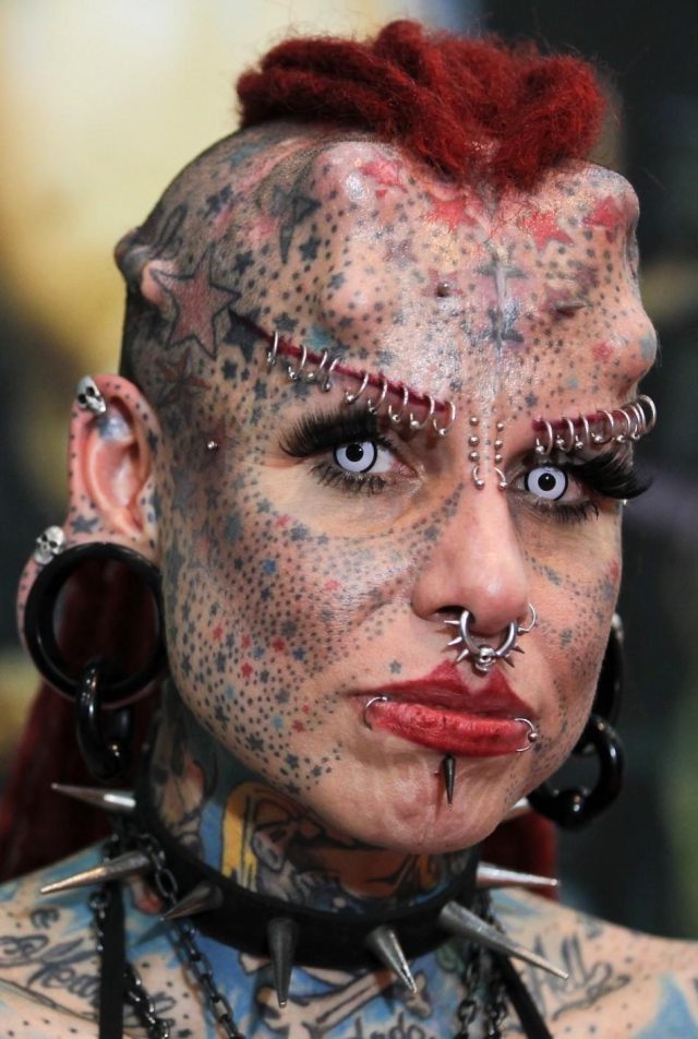 Extreme vampire face tattoo