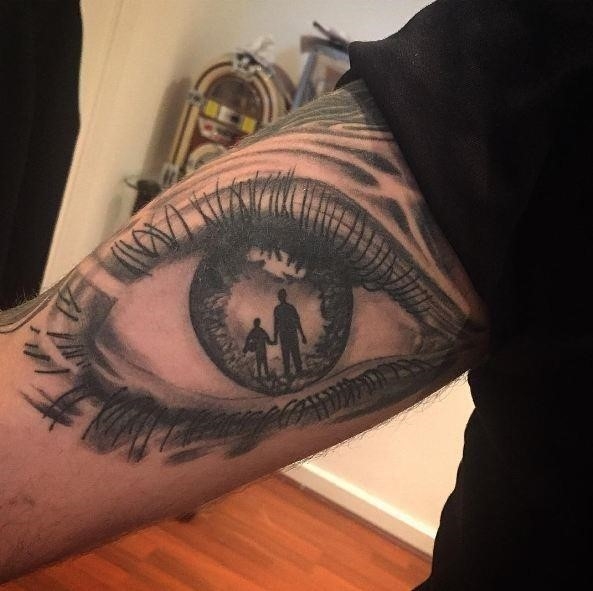 Eye with father son tattoos