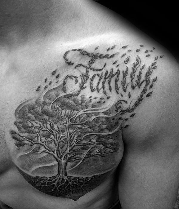 Family tree with leaves blowing in the wind mens chest tattoo designs