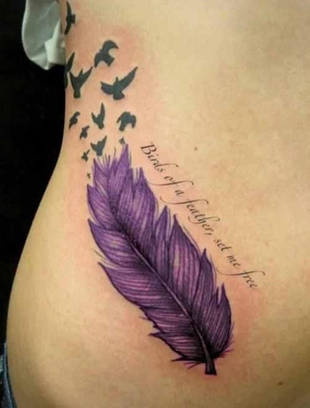 Feminine feather tattoo
