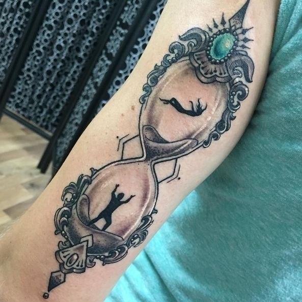 Feminine tattoos on arm