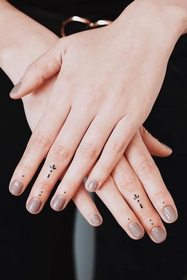 Finger tattoos dots minimalistic