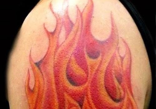 Fire flame tattoo on shoulder