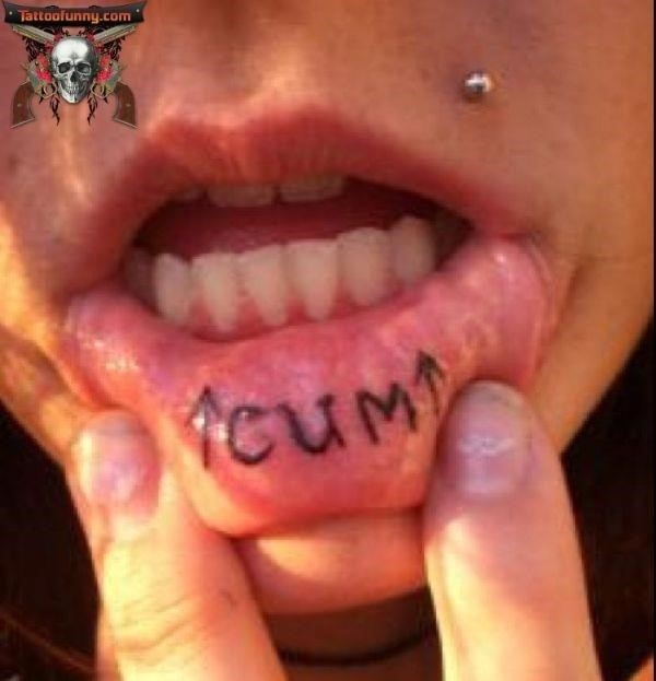 Funny tattoo on girl lip