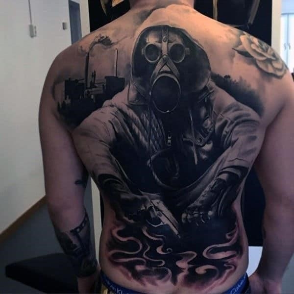 Gas mask black ink back male tattoo ideas