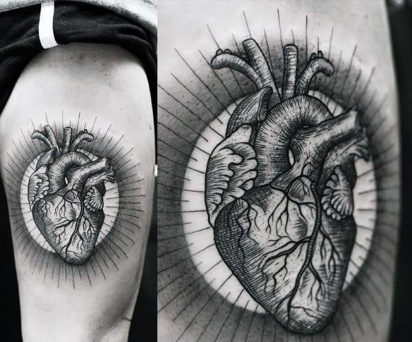Gentleman with heart tattoo in black ink on thigh surrounded by halo