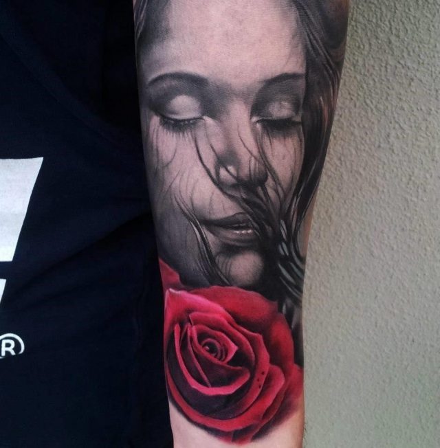 Girl closing eyes tat
