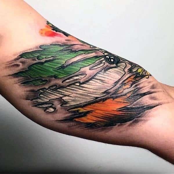 Green orange and white irish flag mens torn skin arm tattoo
