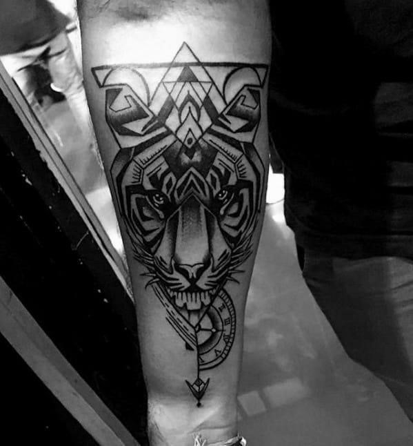 Guy with geometric animal tattoo design
