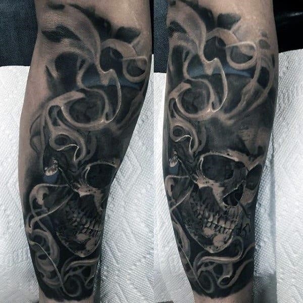 Guys forearm sick grey smokin skull tattoo