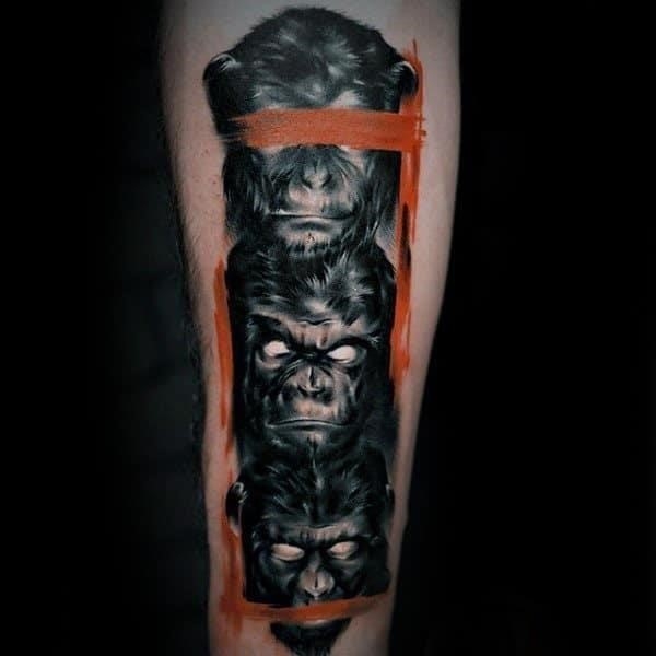 Guys forearms sick tattoo of three monkeys