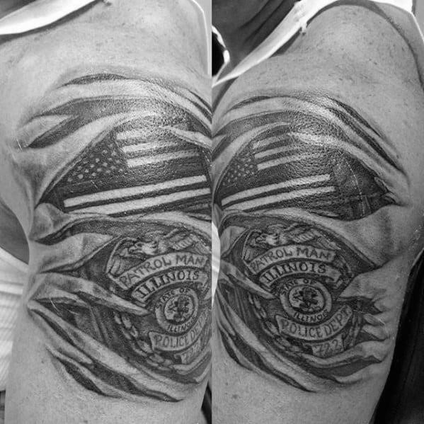 Guys police torn skin american flag patch and badge tattoo on arm