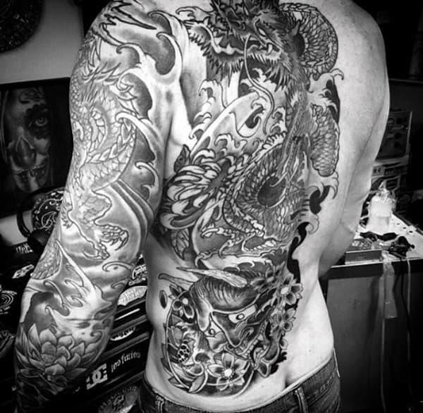 Half side of back guys dragon tattoos
