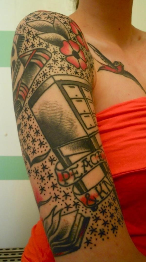 Half sleeve peace and king tattoo
