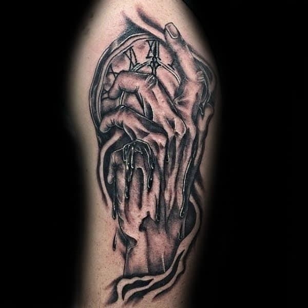 Hand holding melting clock mens arm tattoos