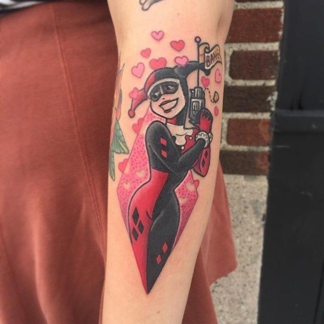 I got a new tattoo Its Harley Quinn diamonds I  Die and be reborn  with a better personality