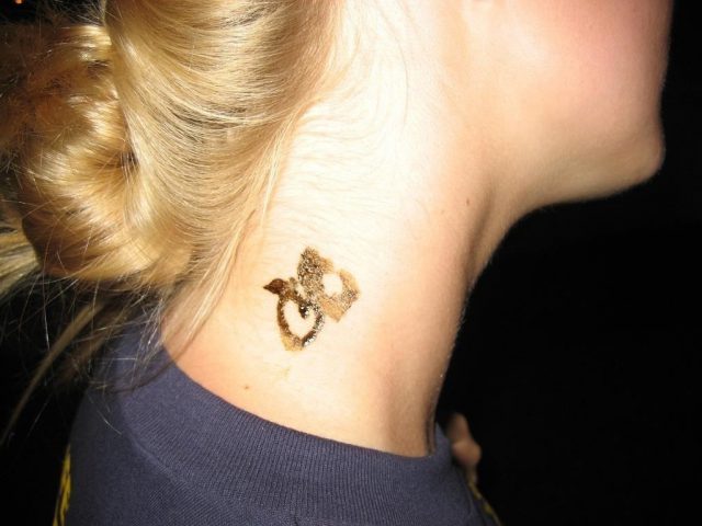 Henna neck tattoo