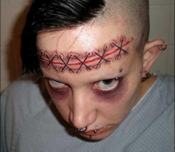 Horrible face tattoo