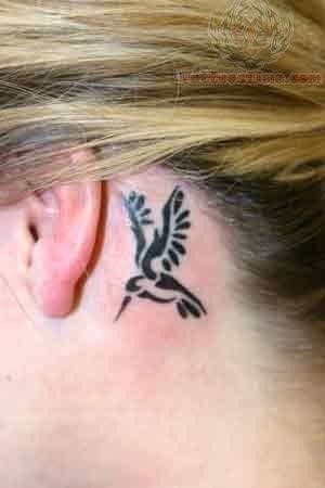 Hummingbird tattoo on ear back