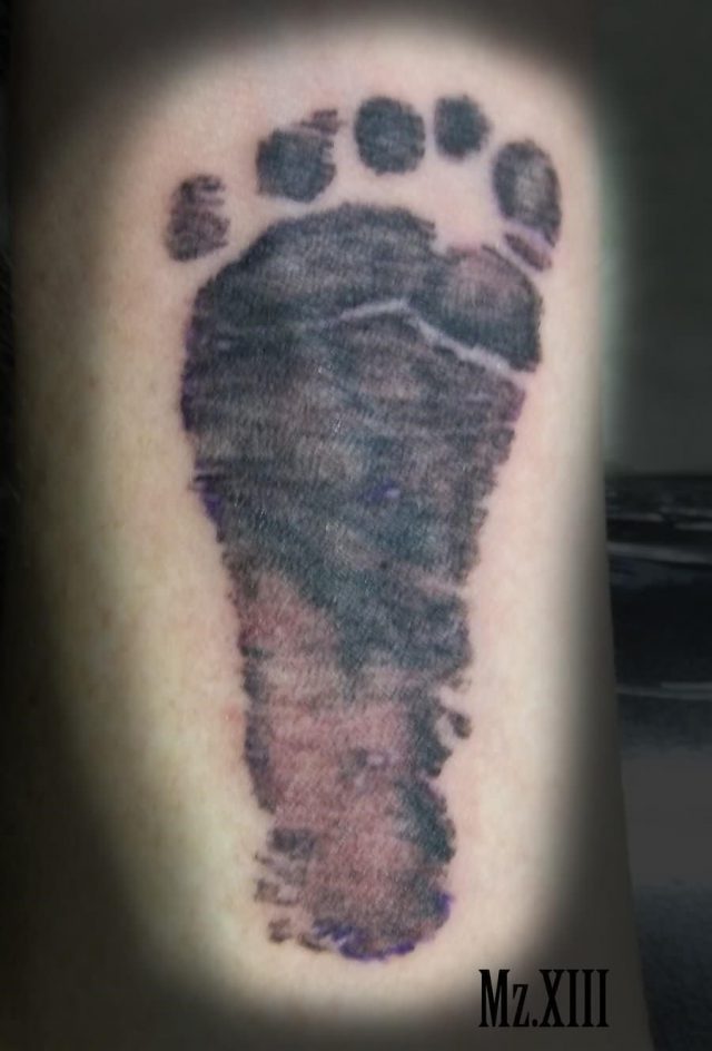 Infant foot print tattoo