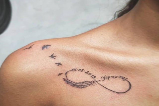 Infinity tattoo with birds