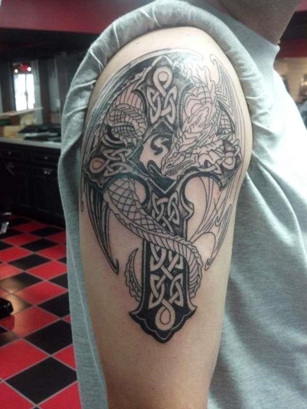 Jaw dropping celtic dragon tattoo