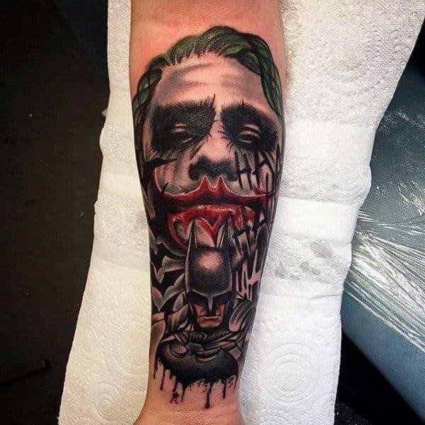 Joker with batman mens inner forearm tattoo designs