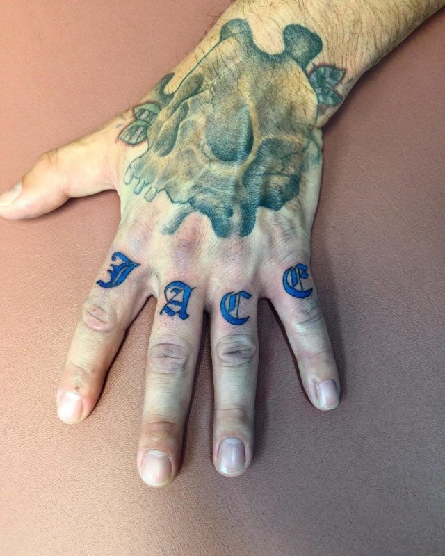 Knuckle tattoo 44