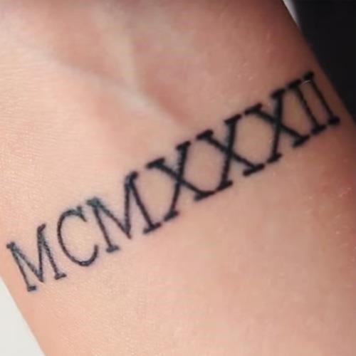 Lauren riihimaki roman numeral tattoo
