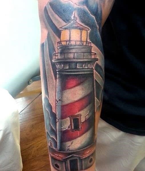 Lighthouse tattoo men arm