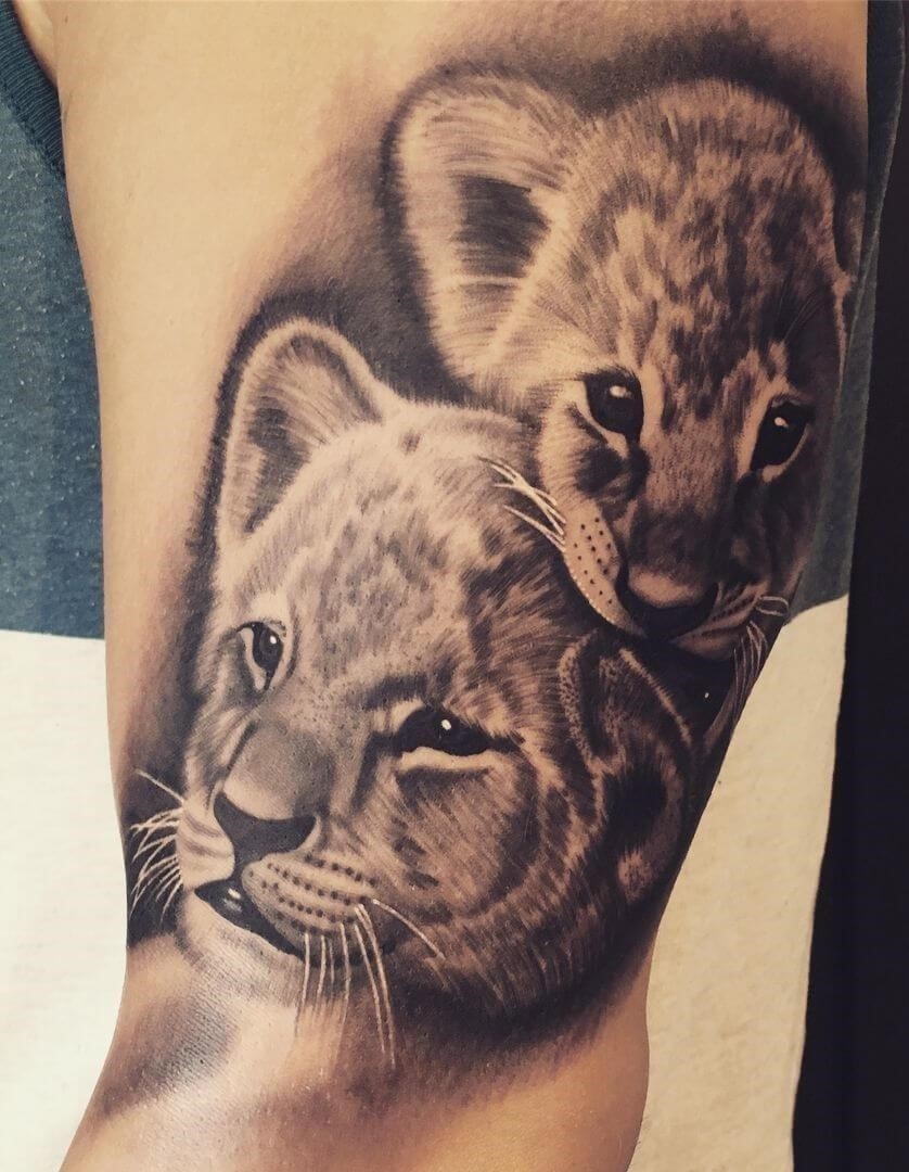 Lion cub tattoo