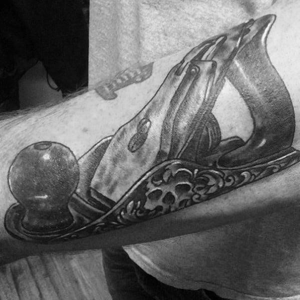 Man with carpenter tattoo design
