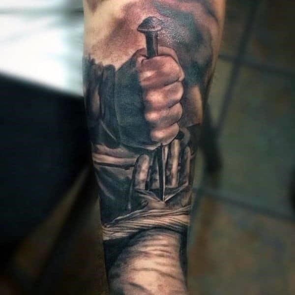 Manly christian tattoo designs for men on inner forearm and wrist