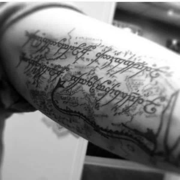 Map lord of the rings themed guys inner arm bicep tattoo